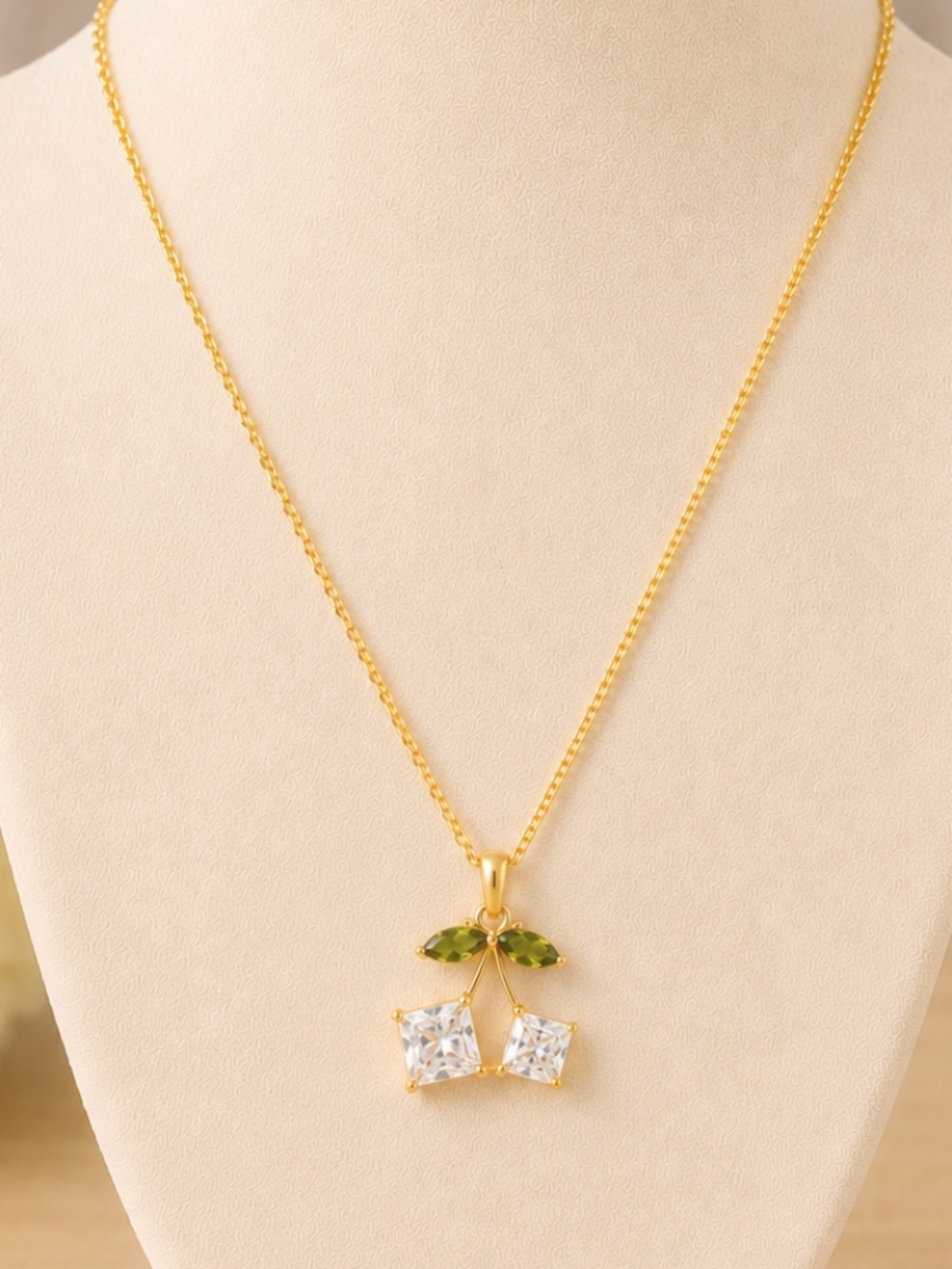 Gold necklace with cherries